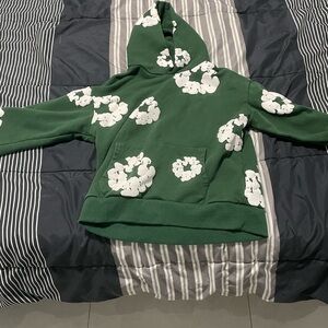 Denim Tears Green Hoodie with White Floral Accents
